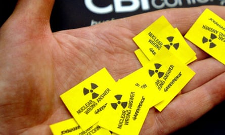 Anti-nuclear stickers in someone’s palm 