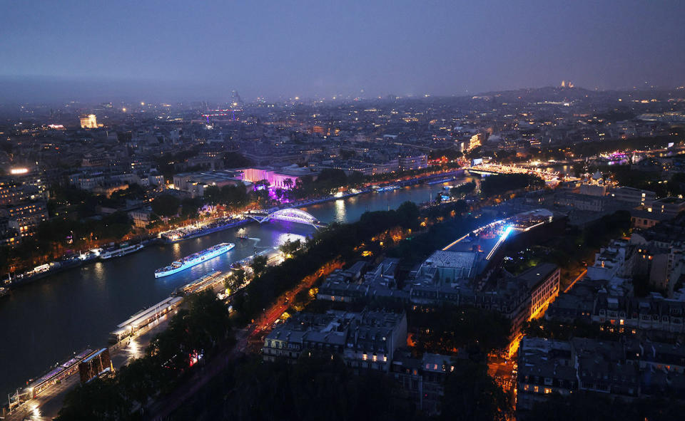 The city of Paris, pictured here as athlete boats travel along the River Seine.