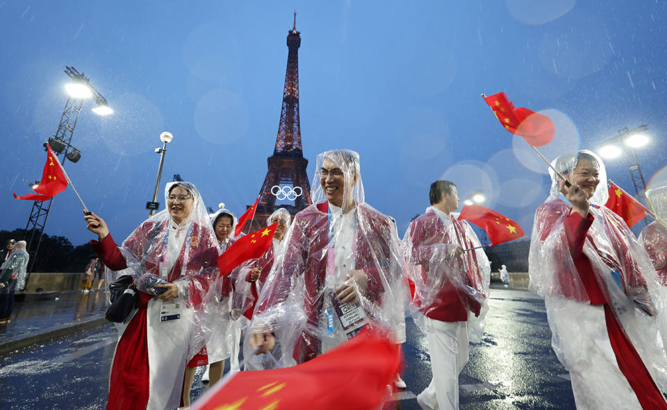 Athletes from People's Republic of China, pictured here in ponchos during the opening ceremony.