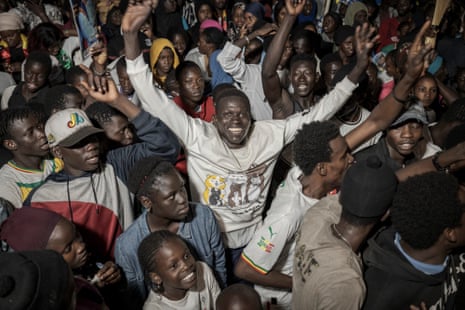 People celebrating Bassirou Diomaye Faye’s win in Senegal’s presidential elections in Dakar.