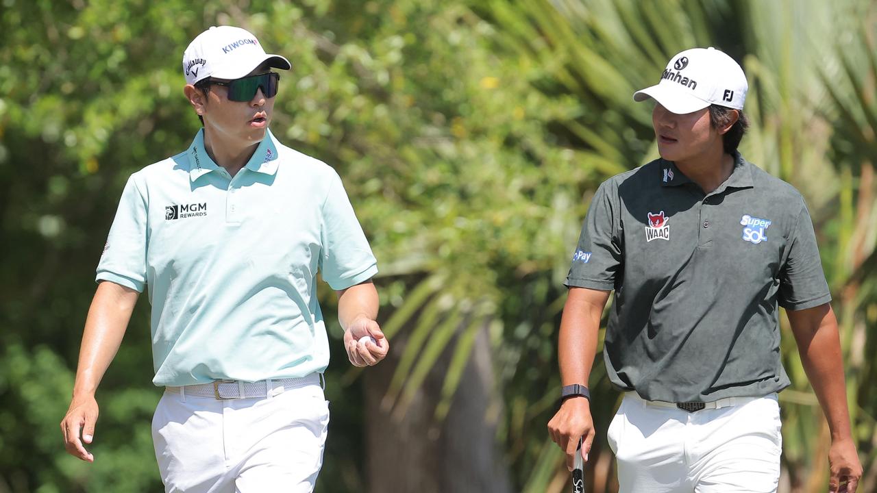 AVONDALE, LOUISIANA - APRIL 25: Sang-moon Bae and S. H. Kim of South Korea speak from the 11th tee during the first round of the Zurich Classic of New Orleans at TPC Louisiana on April 25, 2024 in Avondale, Louisiana. Jonathan Bachman/Getty Images/AFP (Photo by Jonathan Bachman / GETTY IMAGES NORTH AMERICA / Getty Images via AFP)