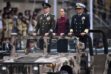 Mexico’s President Claudia Sheinbaum attends a military parade commemorating the 114th anniversary of the Mexican Revolution.