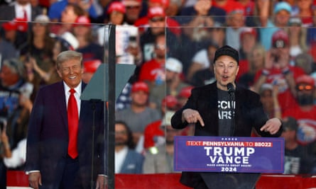 Elon Musk speaks beside Donald Trump during a rally in Butler, Pennsylvania, on 5 October.