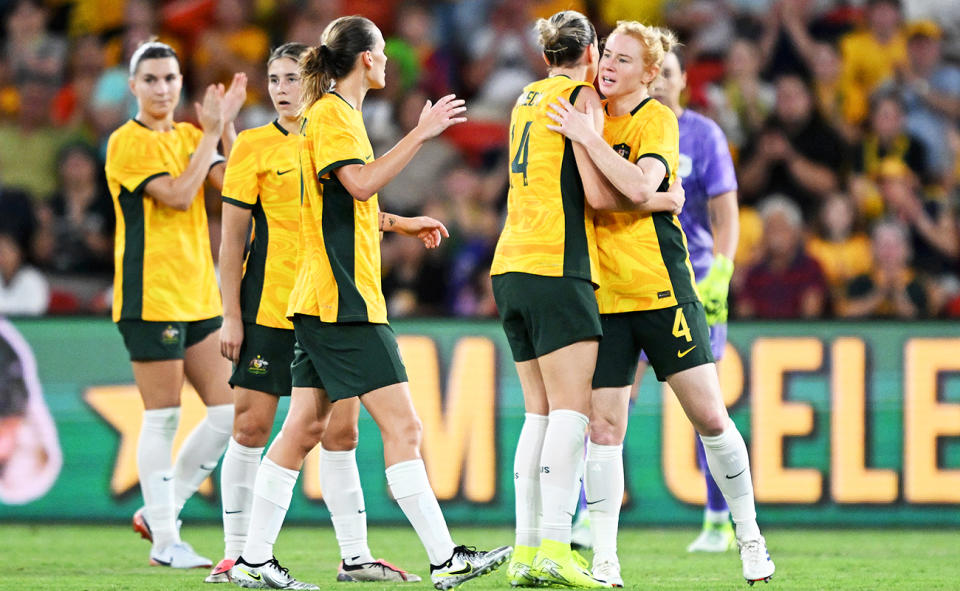 Matildas players, pictured here showing their appreciation for Clare Polkinghorne.