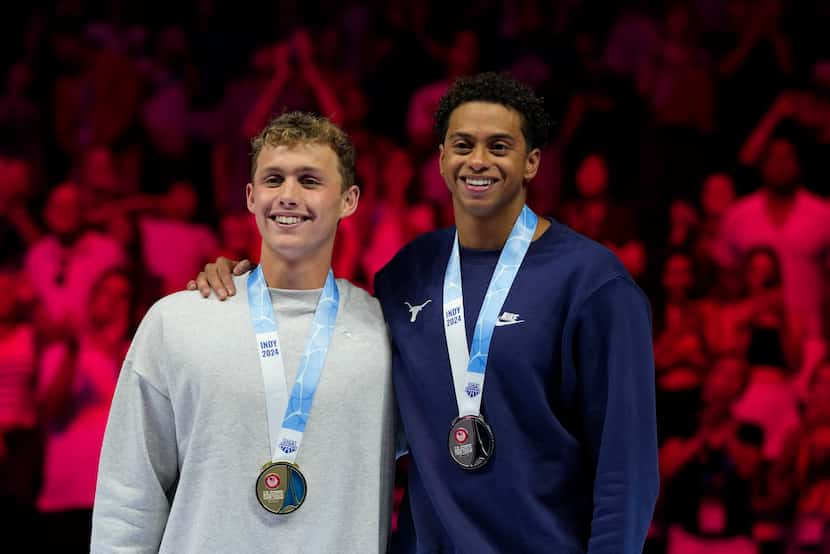 Shaine Casas and Carson Foster celebrate after the Men's 200 individual medley finals...