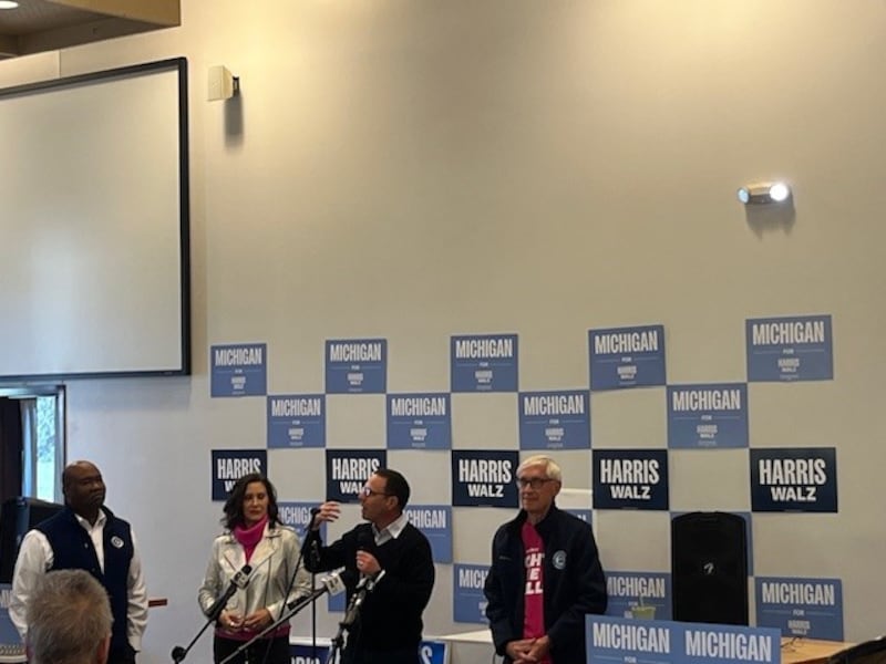 Gretchen Whitmer, Josh Shapiro and Tony Evers on the campaign trail together in Flint, Michigan. Photograph: Keith Duggan