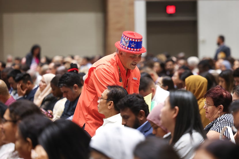 Benny de la Vega, 54, originally from the Philippines, became a U.S. citizen in 1995. He...