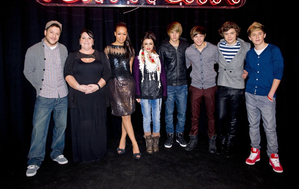 Matt Cardle, Mary Byrne, Rebecca Ferguson, Cher Lloyd and One Direction members Liam Payne, Louis Tomlinson, Harry Styles and Niall Horan at a secret X factor gig in 2010