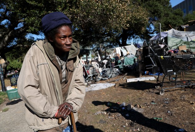 China Richardson, 47, lives at the homeless encampment at Mosswood Park in Oakland, Calif., on Tuesday, Dec. 3, 2024. (Jane Tyska/Bay Area News Group)