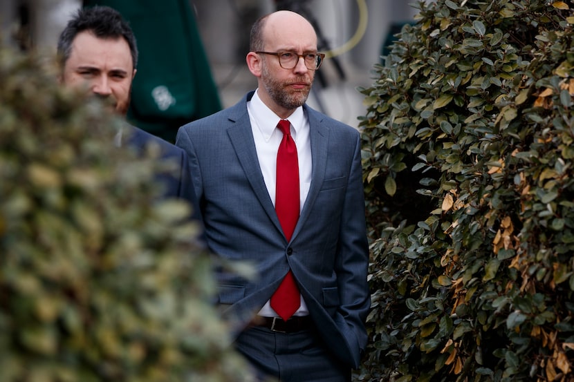 FILE - Acting OMB Director Russel Vought walks towards reporters after doing an interview at...