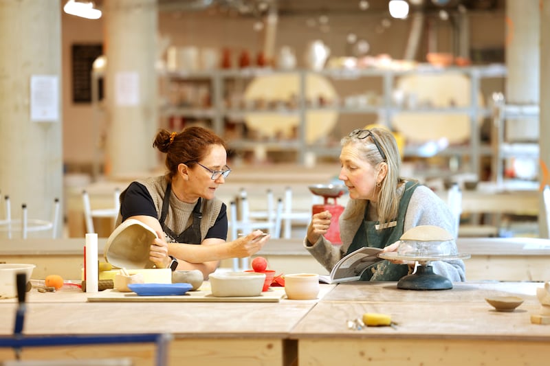Potters exchange tips and ideas at Throwing Shapes. Photograph: Alan Betson
