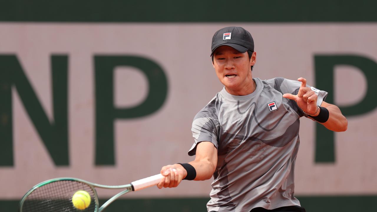 PARIS, FRANCE - MAY 30: SoonWoo Kwon of Korea Republic plays a forehand against Sebastian Korda of United States in the Men's Singles second round match during Day Five of the 2024 French Open at Roland Garros on May 30, 2024 in Paris, France. (Photo by Dan Istitene/Getty Images)