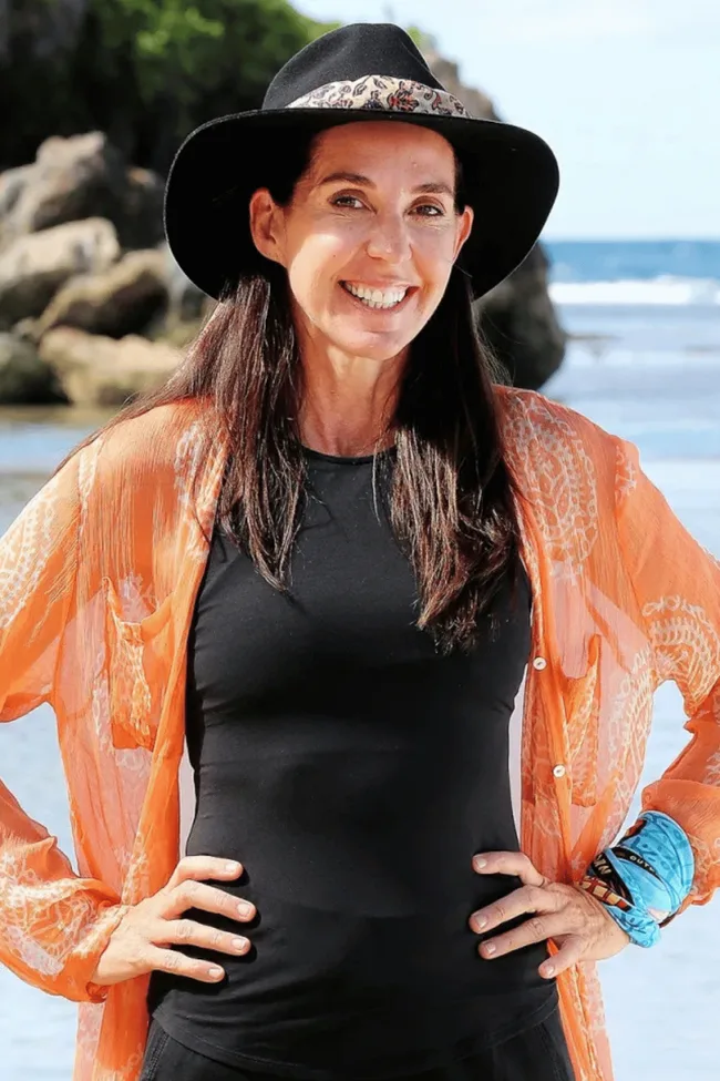 Janine Allis from Australian Survivor posing with her hands on her hips.