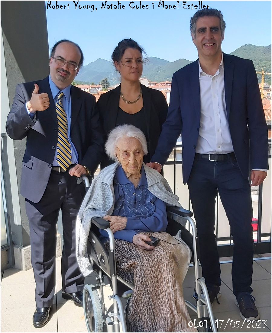 Maria surrounded by her family before her passing