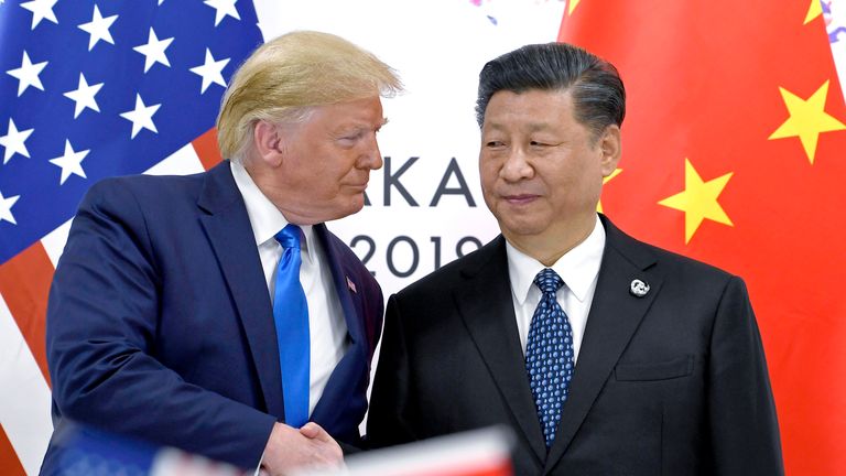 Donald Trump meeting Xi Jinping in 2019. Pic: AP